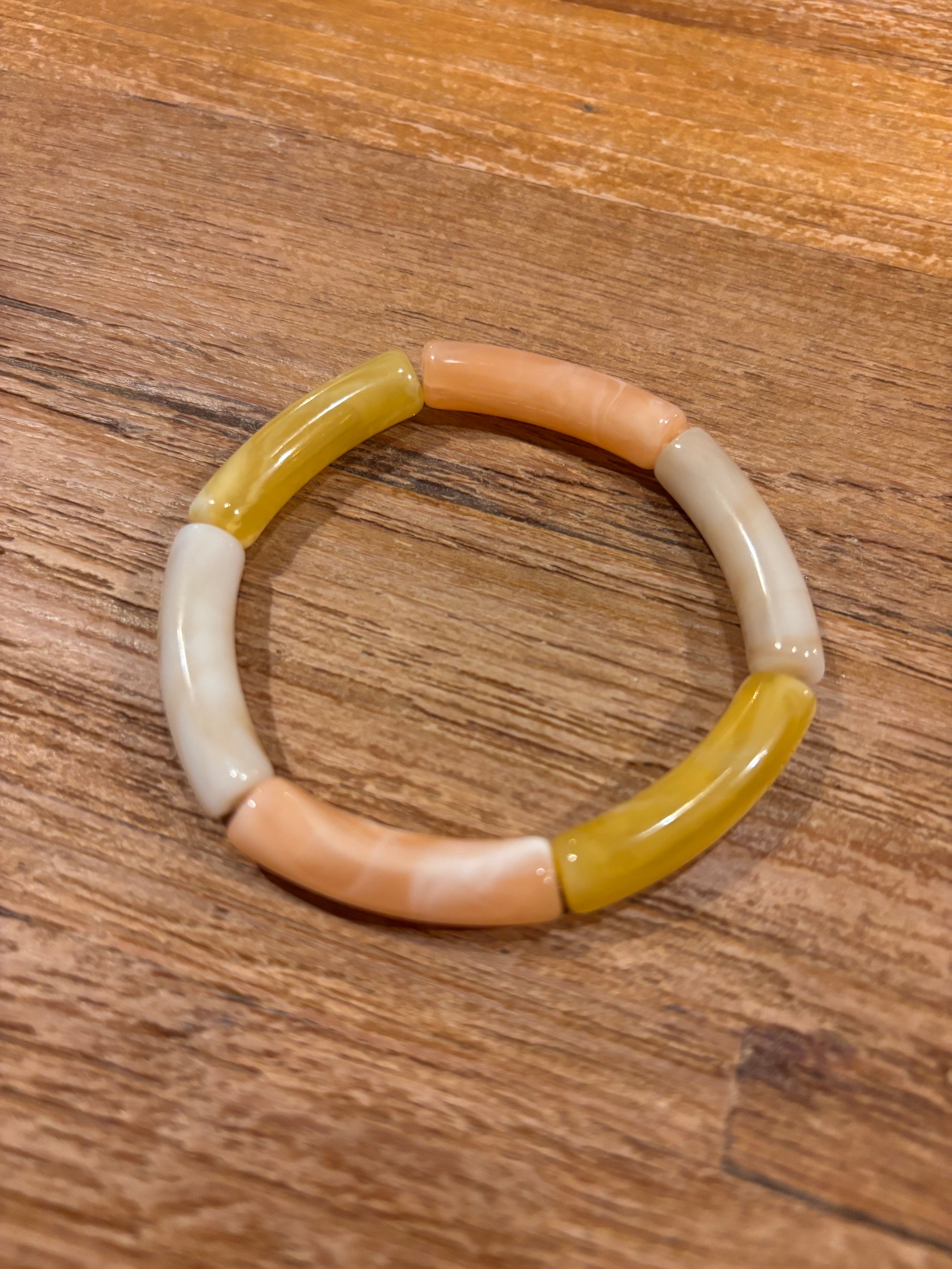 Tube stretch armband geel crème