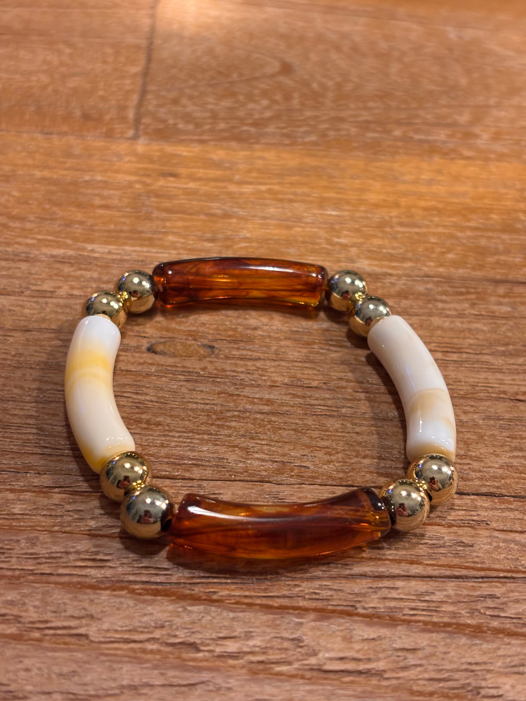 Tube armband amber met crème