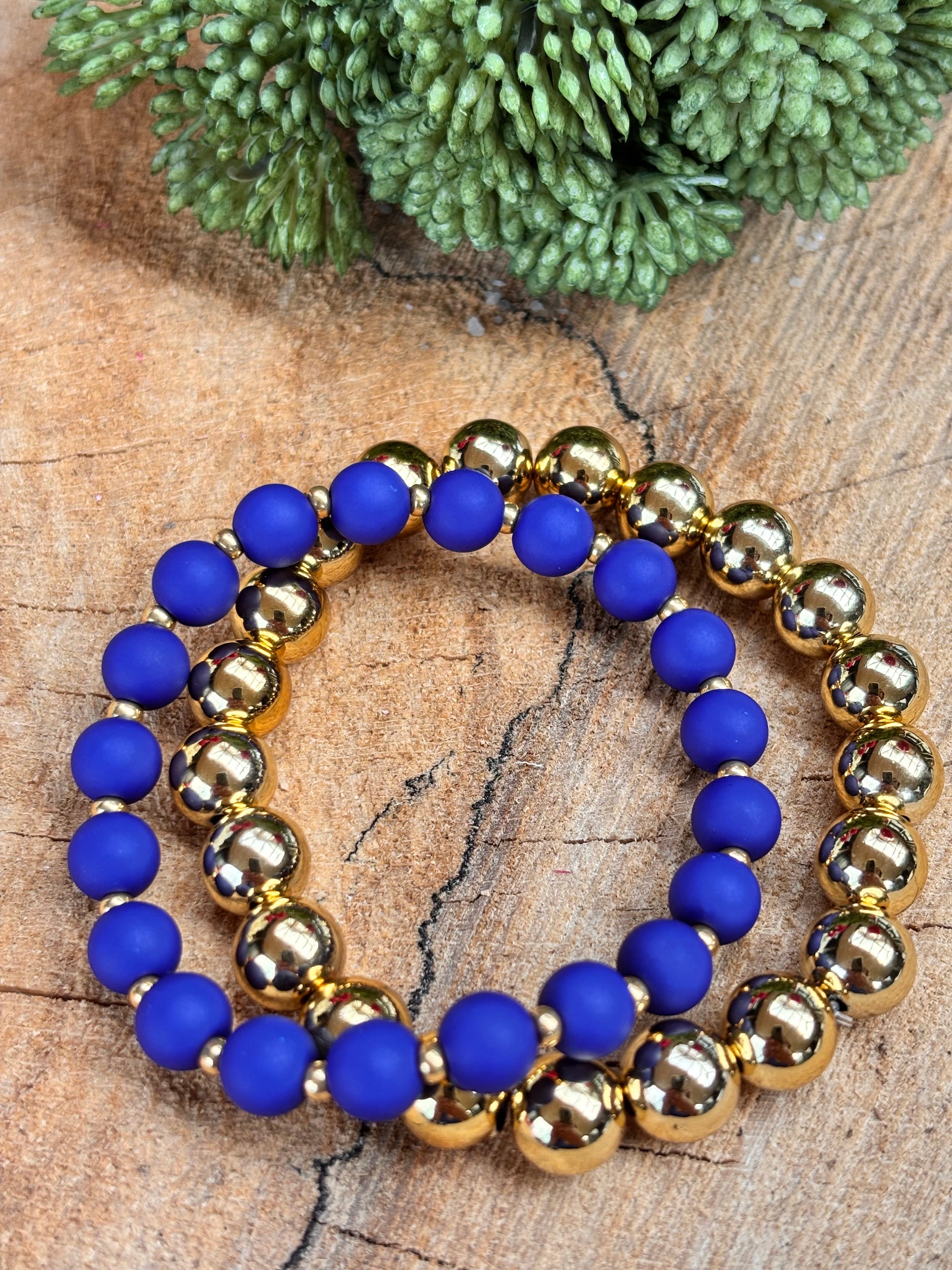 Acryl 8mm armband koningsblauw met goud